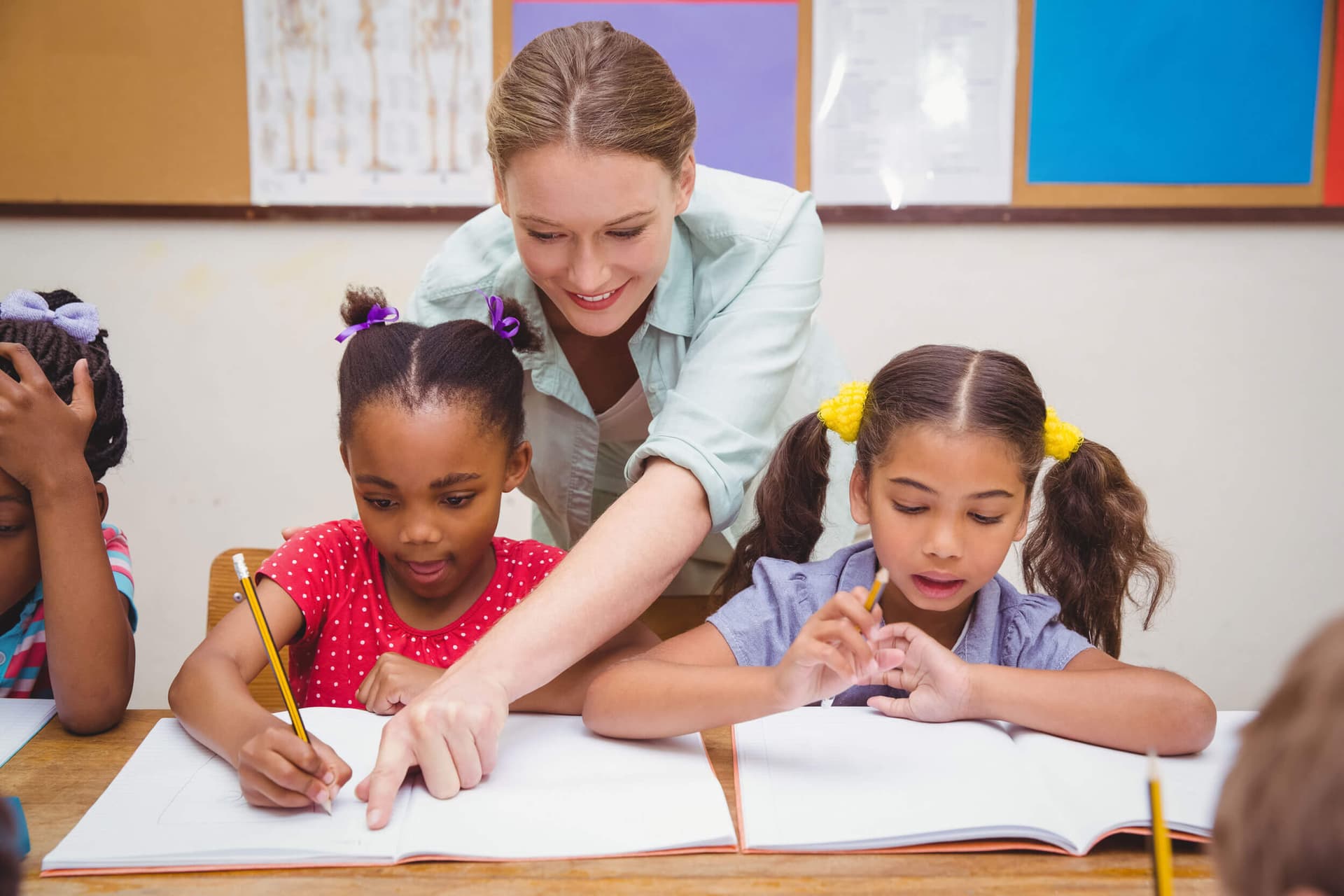Children learning in a Kids Cove classroom